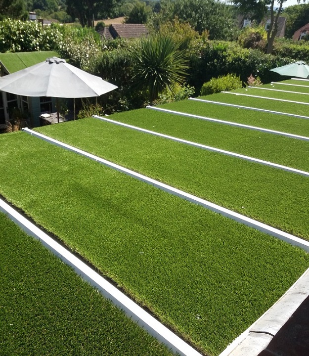 Artificial grass laid on conservatory roof